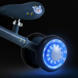 detalle de ruedas led iluminadas de bicicleta Cutie Flash azul