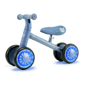 Vista lateral bicicleta Cutie Flash azul con ruedas led brillantes azules