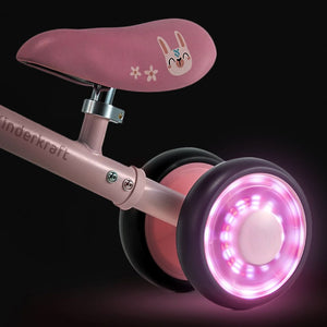 Detalle de ruedas LED luminosas color rosa en bicicleta Cutie Flash rosada