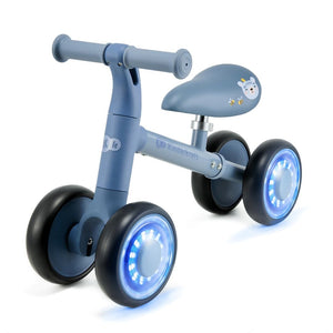 Vista lateral bicicleta Cutie Flash azul con ruedas led brillantes