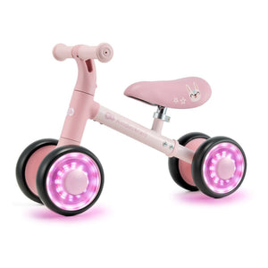 Vista lateral bicicleta Cutie Flash rosada con ruedas led luminosas