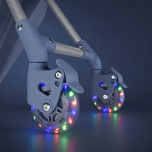 Maleta infantil 2 en 1 con asiento Cabby de Kinderkraft color Azul, detalle de las ruedas con luces LED