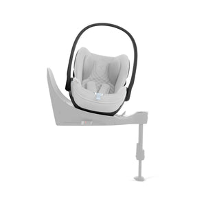 Silla de auto nido Cloud T + Base T i-Size color Cotton White - vista lateral instalada en Base T