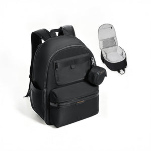 Mochila para pañales Momcozy Urban negra — vista principal cerrada y abierta con interior acolchado