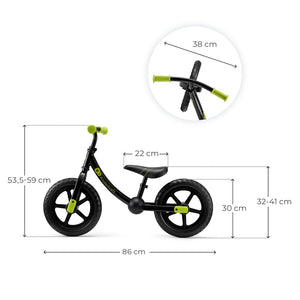Niño montando bicicleta de equilibrio Kinderkraft 2WAY NEXT Black en parque