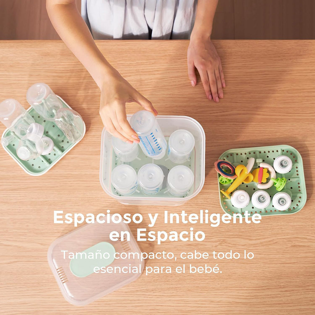 Esterilizador compacto Momcozy 4 en 1 para mamaderas, vista principal sobre mesón de cocina