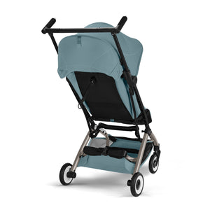 Coche de paseo Libelle 2026 stormy blue de Cybex Gold vista trasera detalle canasta de compra a juego con color del asiento
