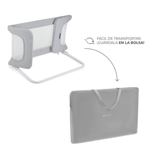 Barrera para cama Guard & Dream - Dos elementos sobre fondo blanco: arriba la barrera plegada en posición compacta con estructura  gris visible; abajo la bolsa de transporte negra rectangular con logo Kinderkraft y asa. Flecha y texto indican que se guarda fácilmente en la bolsa Mini Nuts - Expertos en sillas de auto y coches de paseo