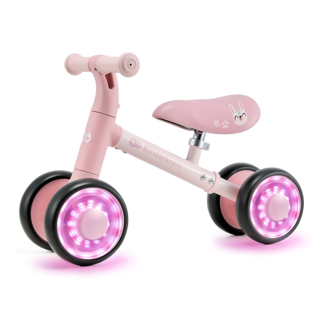 Vista lateral bicicleta Cutie Flash rosada con ruedas led luminosas
