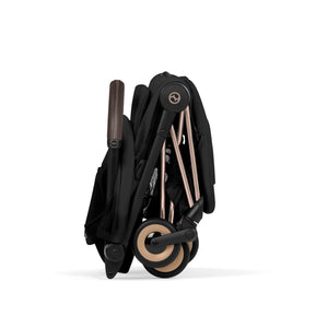 Coche de paseo Cybex Coya Style Collection Sepia Black plegado de forma ultracompacta