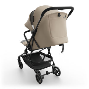 Coche de paseo de cabina Nebo Kinderkraft color beige, vista trasera con bolsillo