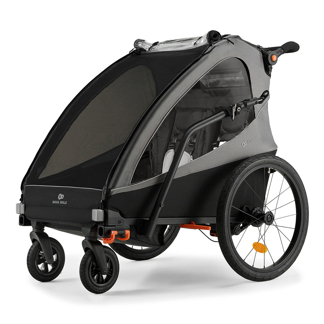 Remolque de bicicleta y coche de paseo Nava Walk 2 en 1 Kinderkraft en gris, vista frontal en ángulo mostrando el interior con arnés de seguridad