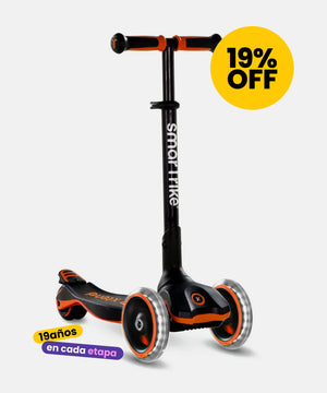scooter para niño pequeño color negro y naranjo marca smartrike 19% de descuento mininuts 19 años en cada etapa
