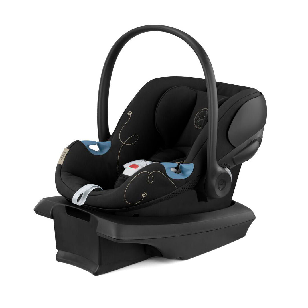 Silla de auto nido para Travel System Cybex Aton M i-Size - vista frontal con icono de plegado