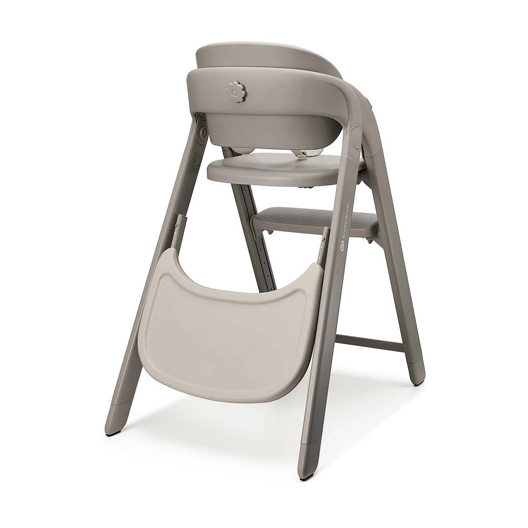 Silla de comer 3 en 1 Tino de Kinderkraft color Beige, vista trasera en ángulo con la bandeja abatida